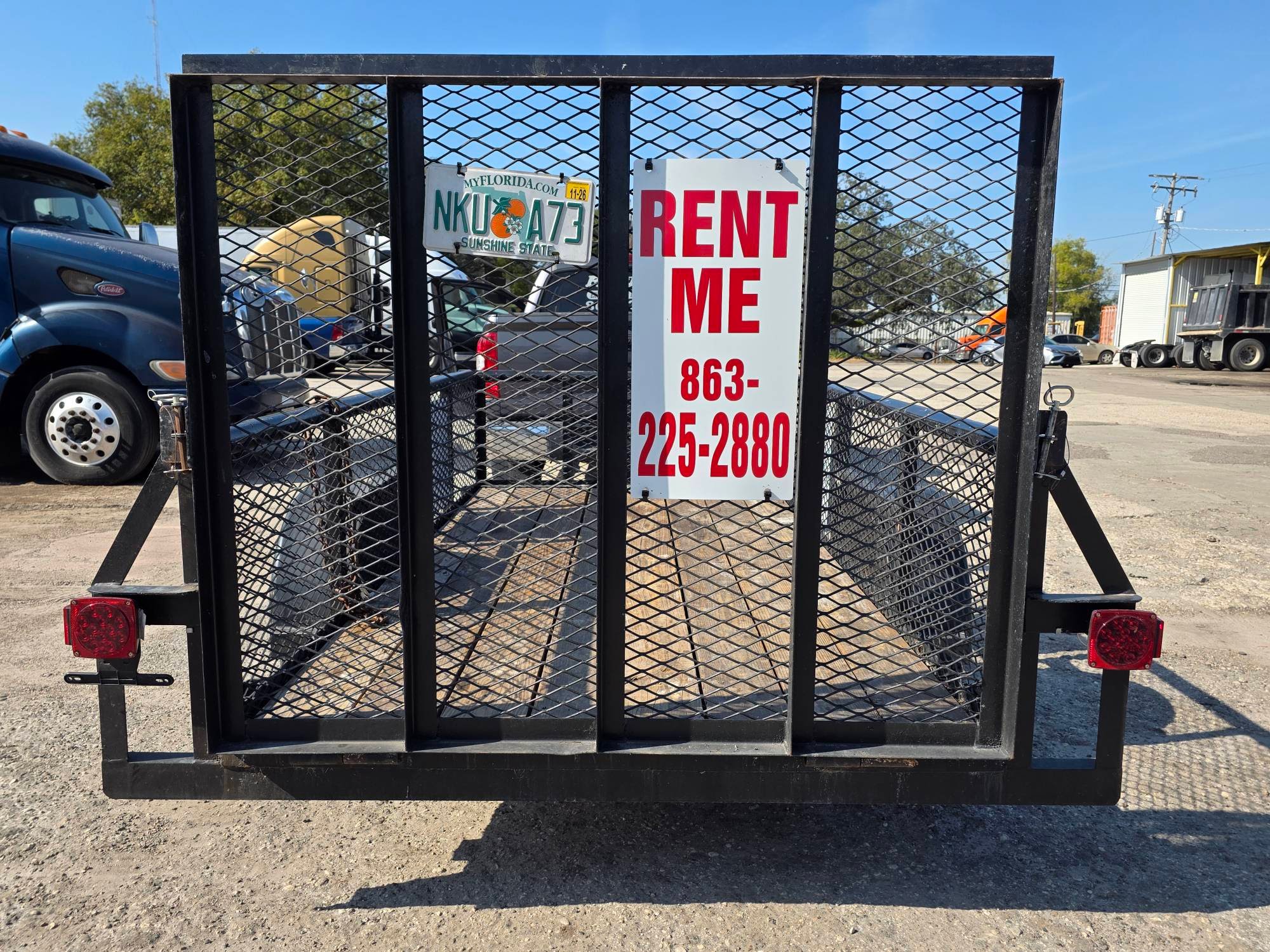 Mesh-side utility trailer available for rent