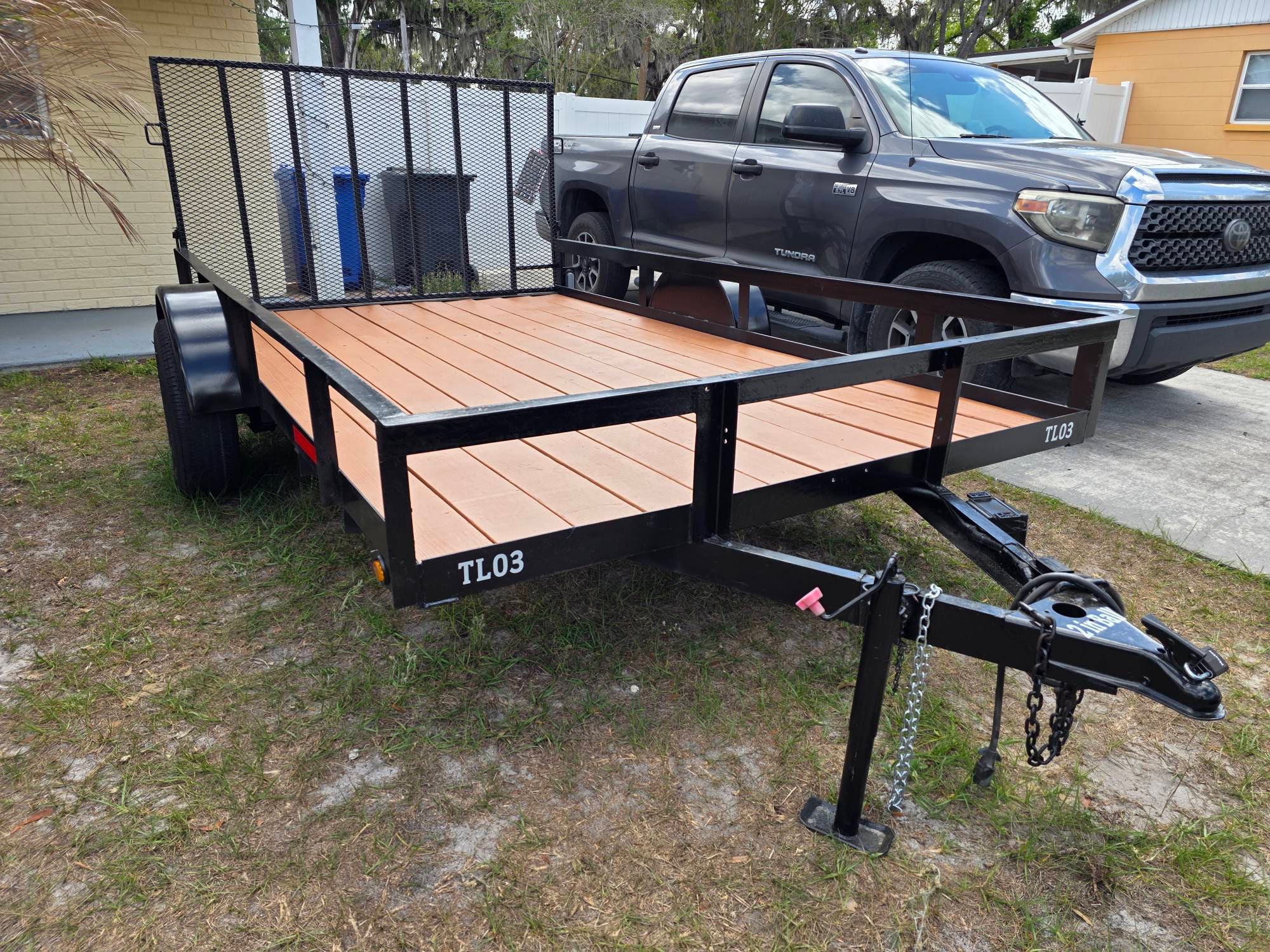 Wood-deck utility trailer available for rent